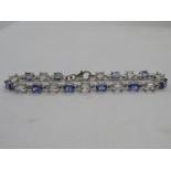 Silver bracelet set with alternate tanzanite and CZ stones 7.5" 9.3g