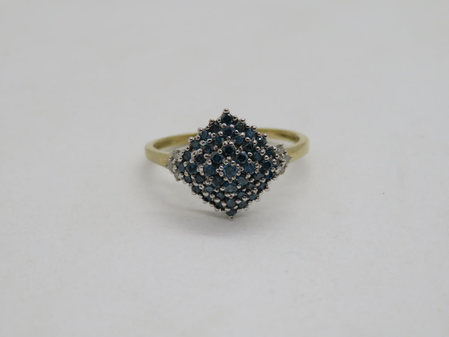 9ct gold HM ring set with approx .5ct blue and white diamonds size P