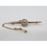 4.2g boxed 18ct gold bar brooch with approx 1ct diamonds