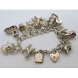 Large silver charm bracelet 78g