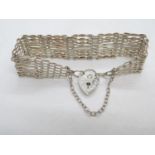 Vintage silver 8 bar gate bracelet with lock and chain London 1979 20.6g