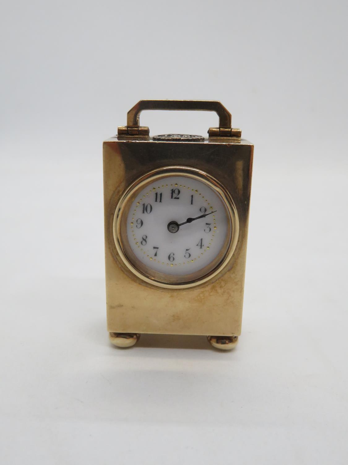 Miniature carriage clock 9ct gold HM E and S 375 London on an R - 54g