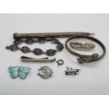 Collection of silverware jewellery, enamelled silver butterfly and silver pencil