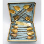 Boxed collection of silver spoons collected by JE Vavasour at placed he visited in the 1914 war