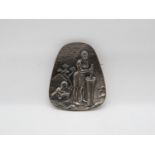 Silver brooch with African village scene