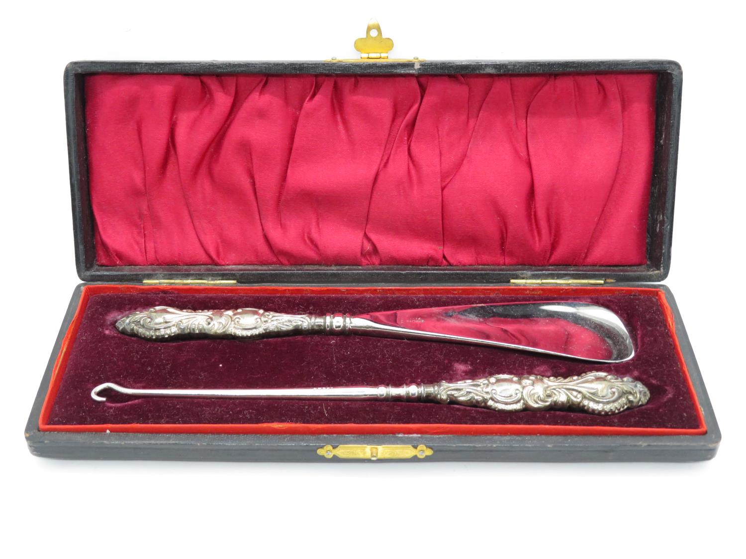 Boxed set of silver shoehorn and button hook