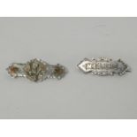 2x small silver Victorian badges - one NELLIE and one of flowers