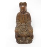 Very early wooden 10" high Buddha