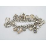 Vintage silver charm bracelet London 1978 20 charms 62.5g