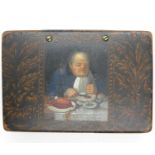 Early possibly Dutch snuff box in paper mâché with painted picture of plump man feasting on meat -