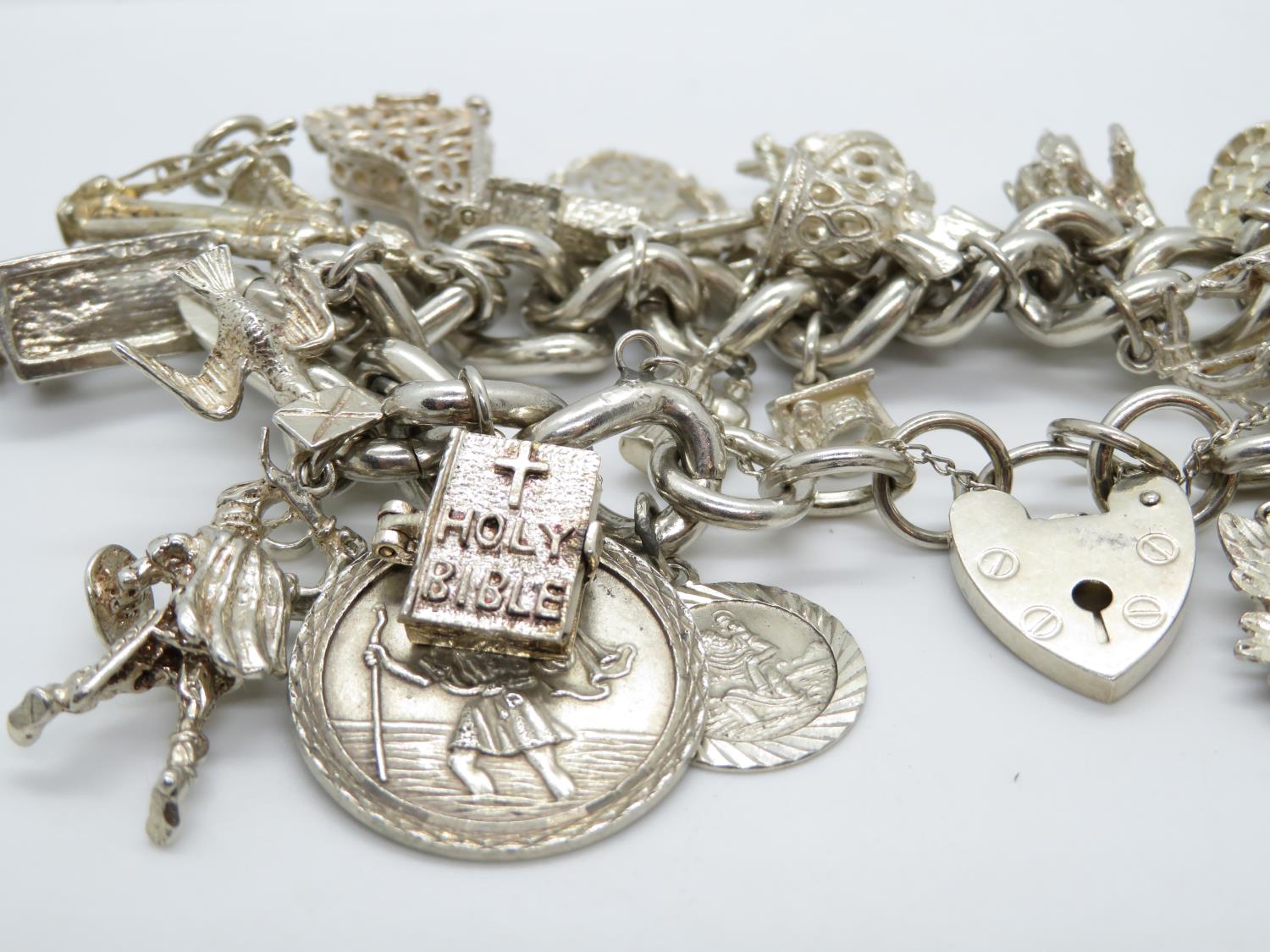 Heavy silver charm bracelet with 29 nice charms London 1978 114g - Image 2 of 2