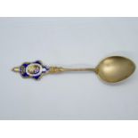 Silver gilt spoon with enamelled Royal Crest 13g