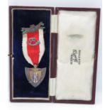 Silver Buffs medal in leather case