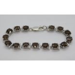 Silver bracelet set with 15x smoky quartz