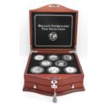 Brilliant uncirculated pure silver 1oz Coins of the World x 8 in wooden collectors box with