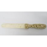 Trivandrum carved early ivory page turner with snake looping through handle