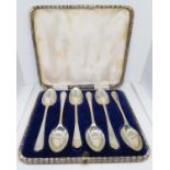 Boxed set of HM silver golfing spoons