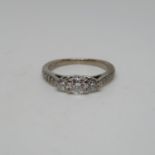 18ct gold size H +.5 with .5ct gold ring with diamonds 2.9g