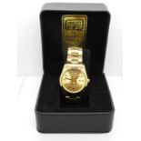 Working boxed Credit Suisse 1g fine gold displayed on face of watch