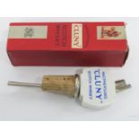 Rare miniature early Cluny whisk with vintage bottle top