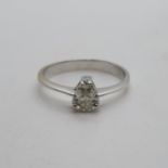 Pear shaped diamond in 18ct white gold shank. 6.42mm x 4.81mm wide approx .6ct size R