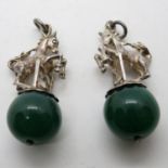 2x pendants of jumping horses on green stone globes