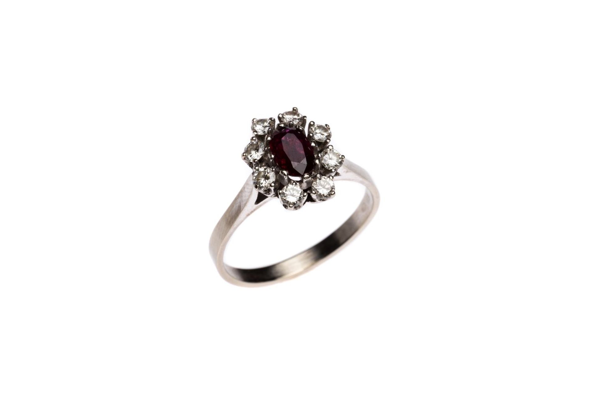 Brilliant ring with ruby14k white gold ring with brilliants total carat weight approx. 0.6 ct, and a