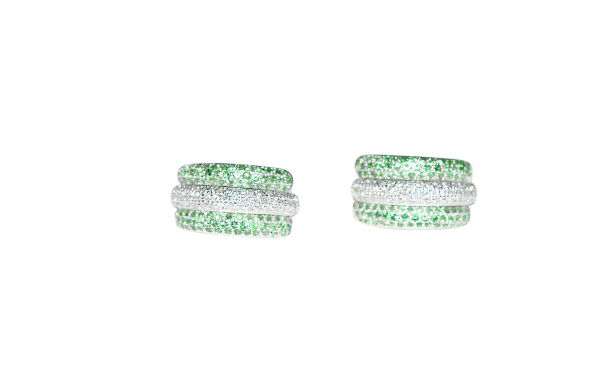 Ear clips18Kt white gold ear clips, with diamonds total carat weight approx. 0.77ct and tsavorite,