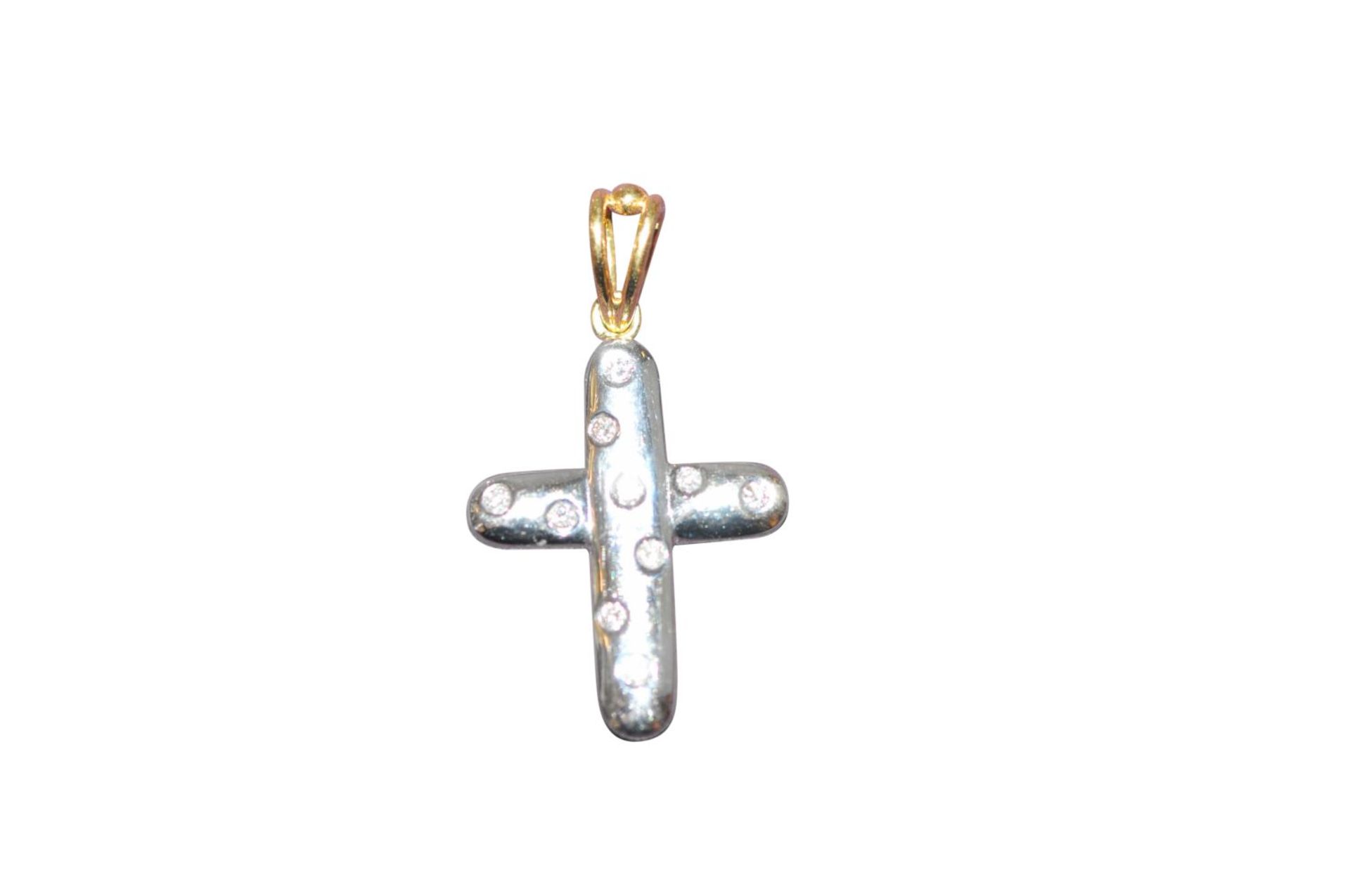 Diamond cross pendant18kt white/yellow gold cross pendant, with diamonds, approx. 0.36ct, total