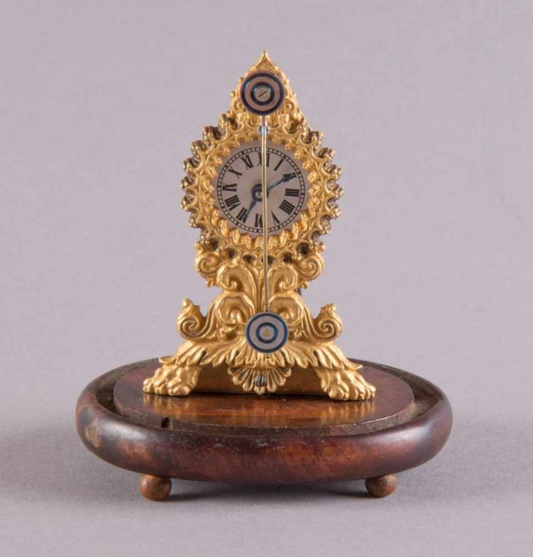 fire-gilded fidgetFidget Clockaround 1830 H 9.5 cm x W 8 x D 6.5 cm fire-gilded and cast case,