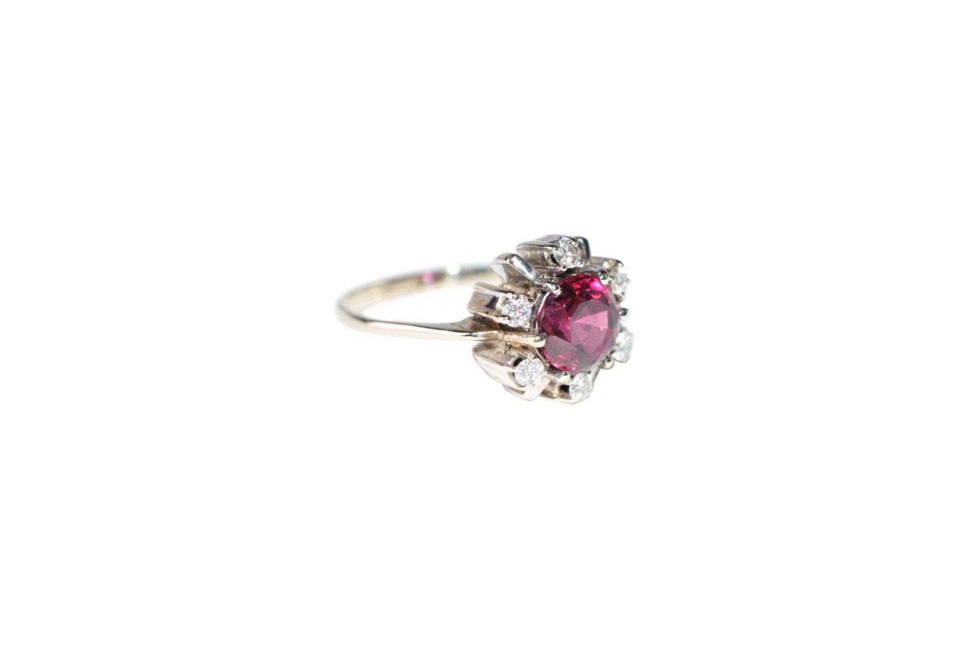 Brilliant ring with tourmaline14Kt gold ring with diamonds total carat weight approx. 0.18ct, and