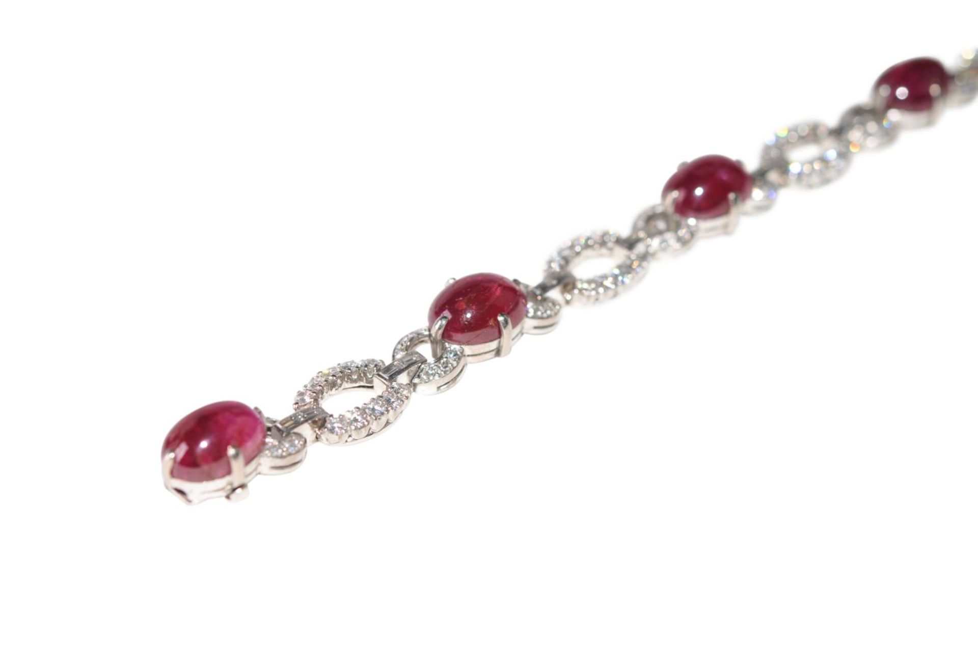 Platinum-brilliant-ruby braceletBracelet, partly Pt 950/000 and 18kt white gold with diamonds