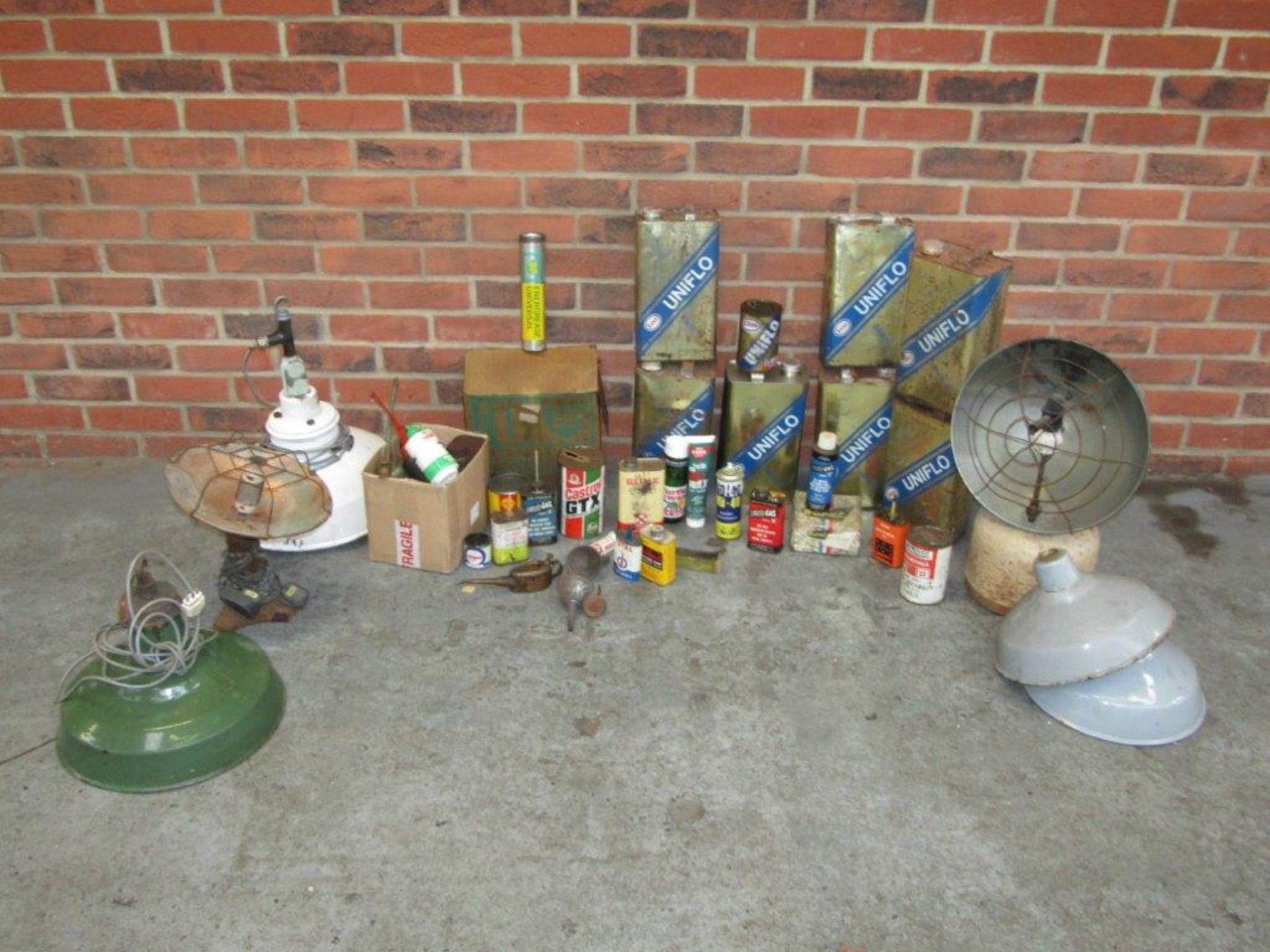 A Large Collection of Assorted Cans, Tins and Vintage Lamps