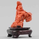 "Buda de la Felicidad" Figura escultórica realizada en coral rojo. Trabajo Chino, Primera Mitad