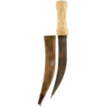 A 19TH CENTURY WALRUS IVORY OTTOMAN JAMBIYA, 21.5cm double fullered damascus blade with small armour