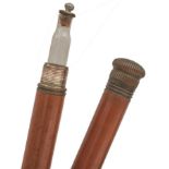 A LATE 19TH/EARLY 20TH CENTURY TIPPLER'S GADGET CANE, malacca haft with copper mounts and metal