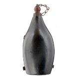 A 17TH CENTURY ENGLISH CIVIL WAR PERIOD LEATHER FLASK, 35cm high excluding the turned wooden