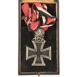 A THIRD REICH JUNKERS L12 JEWELLER'S COPY KNIGHTS CROSS WITH CROSSED SWORDS AND OAKLEAVES, contained