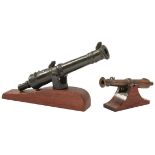TWO BRONZE MODEL SWIVEL CANNON OR LANTAKA, the first with 11inch four-stage sighted barrel,