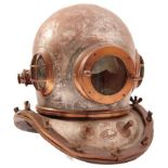 A CHINESE 12 BOLT DIVING HELMET, of characteristic form, retaining traces of tinned finish, barred