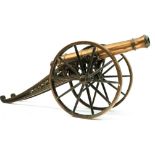 A VICTORIAN BRONZE MODEL CANNON, 13.75inch six-stage tapering barrel with stepped muzzle, plain