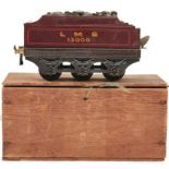 A BOXED BOWMAN TINPLATE TRAIN TENDER, the maroon painted body marked LMS 13000, the wooden box