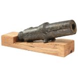 A 19TH CENTURY SMALL CAST IRON SIGNAL OR PYROTECHNIC CANNON, 12inch two-stage barrel, cast with