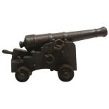 A LATE 18TH OR EARLY 19TH CENTURY CAST IRON ONE AND A HALF POUNDER MERCHANT CANNON, 31.75inch five-