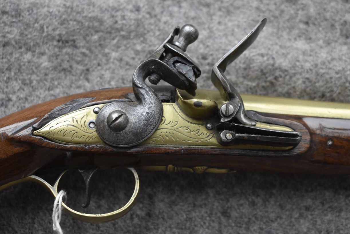 AN 18-BORE FLINTLOCK HOLSTER PISTOL BY KETLAND, 8inch brass barrel engraved with a foliate - Image 4 of 12