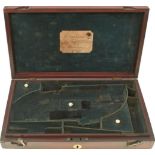 A MAHOGANY PISTOL CASE FOR A PAIR OF PERCUSSION PISTOLS, the blue velvet lined interior with three