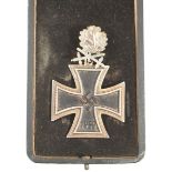 KNIGHT'S CROSS WITH OAK LEAVES AND SWORDS, a Juncker jeweller's copy, the cross stamped 800 L12, and