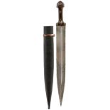 A 19TH CENTURY CAUCASIAN KINDJAL, 48cm broad blade with deep offset fuller to either side,