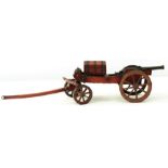 A 19TH CENTURY MODEL FIELD GUN, 5inch four-stage bronze barrel, the breech cast in relief with a