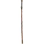 A 19TH CENTURY TRIBAL WALKING CANE, the horn and braided leather pommel unscrewing to reveal a 6.5cm